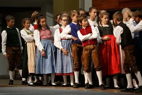 Children's choir in traditional costumes at the World Choir Games