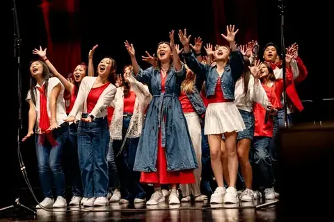 Pop, jazz and show choir performing on stage